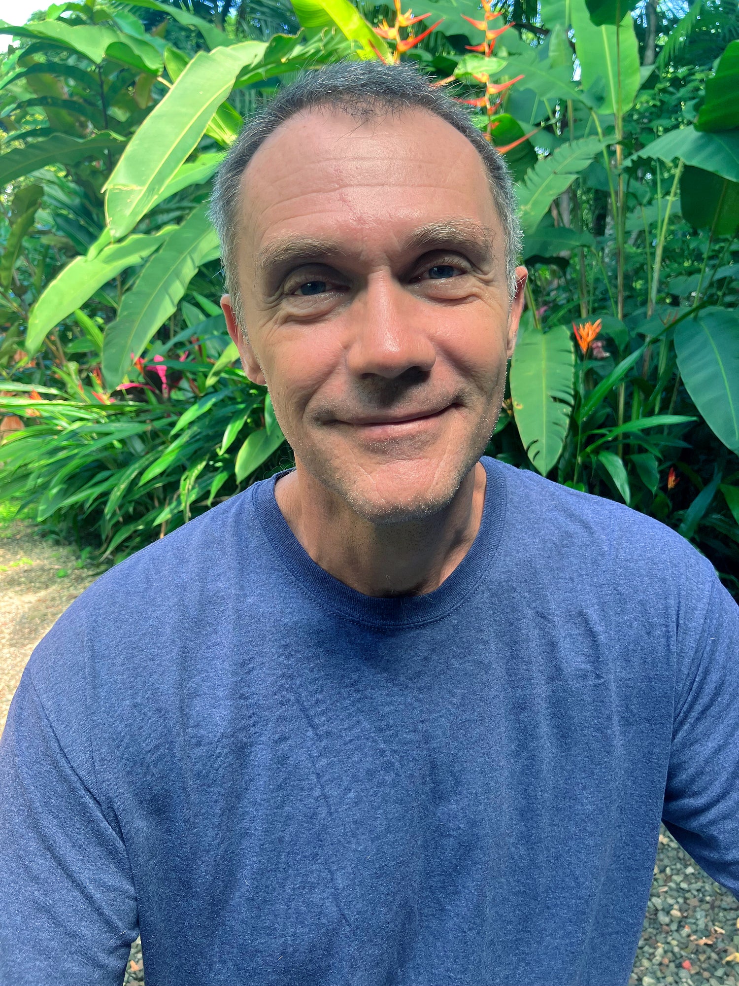 Arsen Brzostek in a blue shirt at his Costa Rican home.